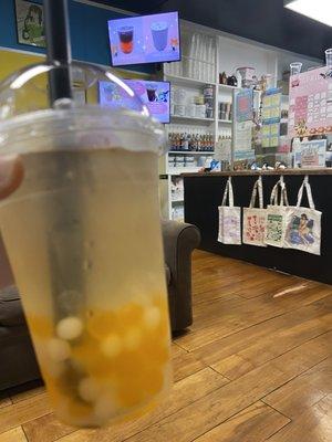 Lychee lemonade with yogurt and mango popping boba