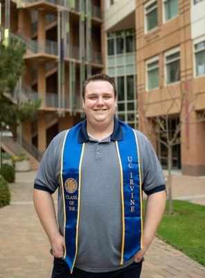 A graduation portrait session for a UCI student