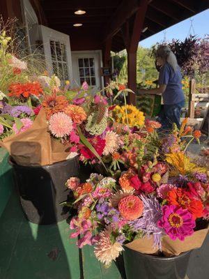 Flower bouquets at farmstand porch