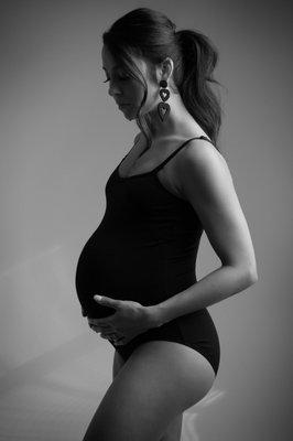 Maternity sessions in bodysuit .