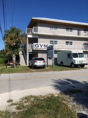 Conveniently located at 21460 Overseas Highway, Unit A, Cudjoe Key, FL. 33042.  Entrance door faces US#1, up one flight of stairs.