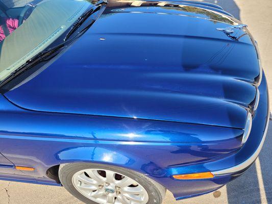 You cannot determine which side was painted, but the hood is freshly painted and color matched! Looks like factory paint!