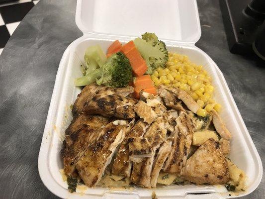 Grilled chicken plate over pasta 2 vegetables and a drink $8.69