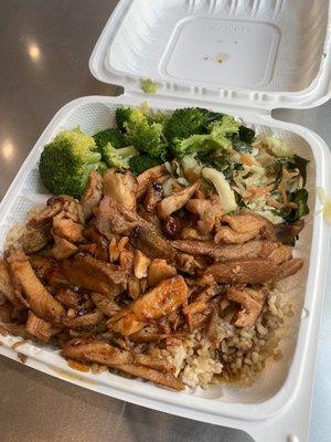 Spicy chicken with broccoli and extra stir fry veggies.