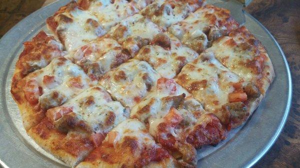 Sausage and tomato pizza