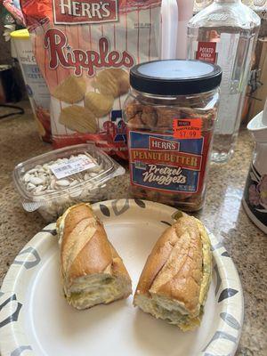 Scrambled egg with green peppers, onions, and cheese with some other treats - pumpkin seeds and Herr's pretzels and chips