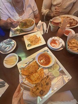 Birria tacos , caldo , and steak plate