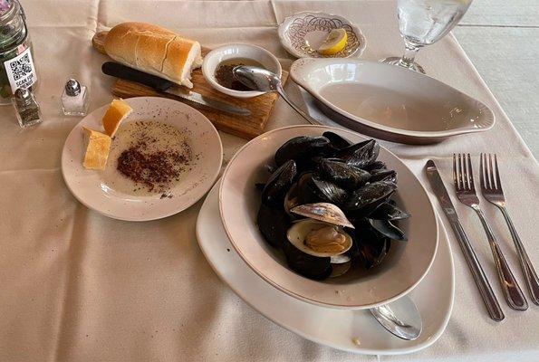 Mussels and clams in garlic and oil sauce with their fantastic bread.