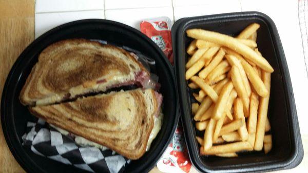 Curbside pickup, Reuben with fries. Well worth the wait for PJs to open for takeout.