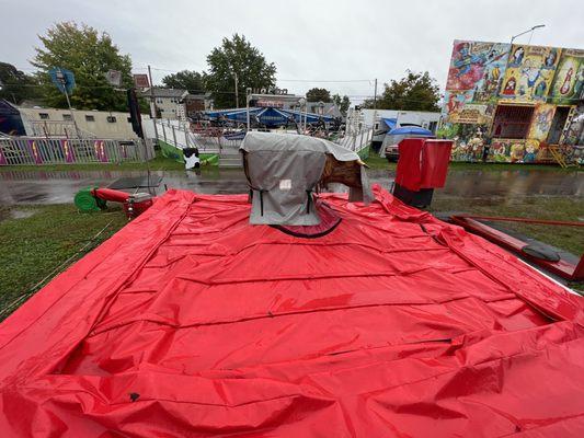 The mechanical bull not covered by a canopy. It was raining when our group went so it's understood why this one wasn't operating.