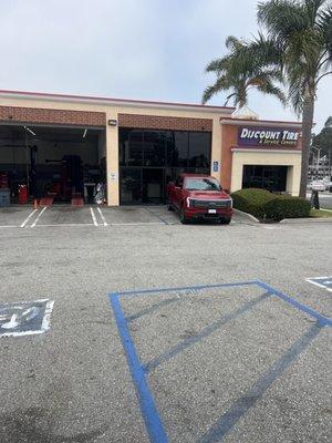 My vehicle waiting to get a tire rotation, wheel alignment, tire repaired, and a general inspection!