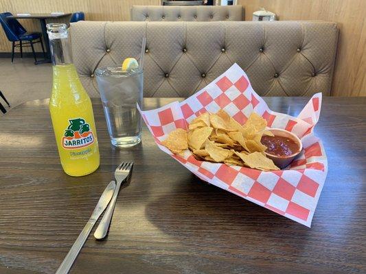 Yum. Chips bd fresh red salsa with piña Jarritos