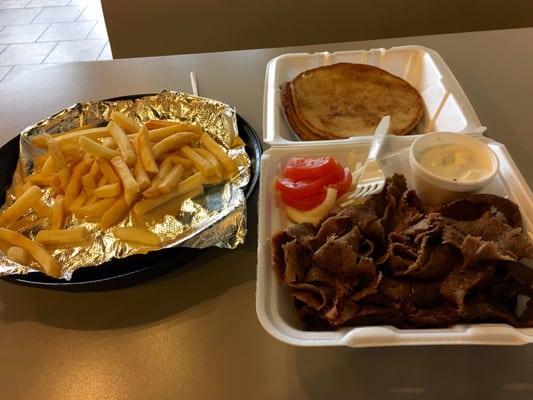 Super gyros plate with fries.