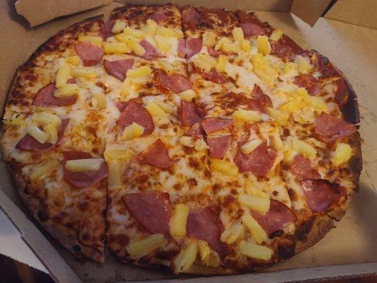 Ham and pineapple thin crust pizza