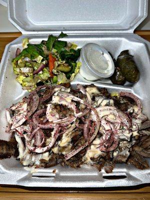 beef shawarma plate, grape leaves, and Mediterranean salad.