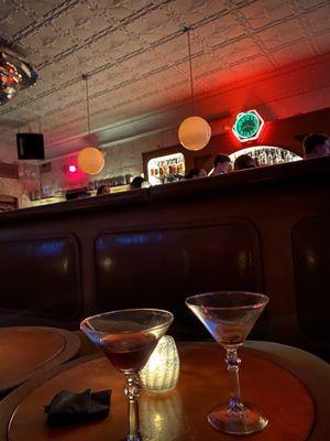 Two sad espresso martinis and the smell of a college bar.