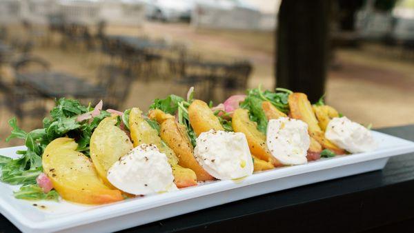 SEASONAL Peach Burrata Salad: grilled local peaches, burrata cheese, arugula, pickled red onion & Uncool citra vinaigrette