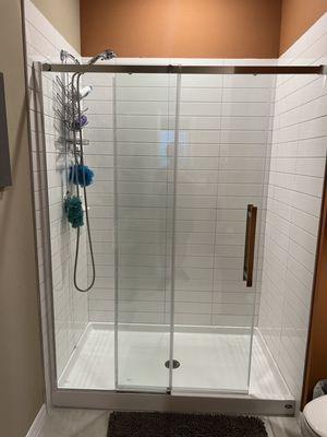 Glass shower door install.