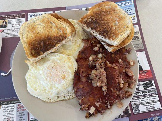 Corned beef hash with eggs and homemade sourdough bread