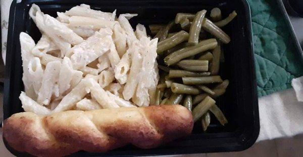 Chicken Alfredo served with Green Beans and Bread Stick