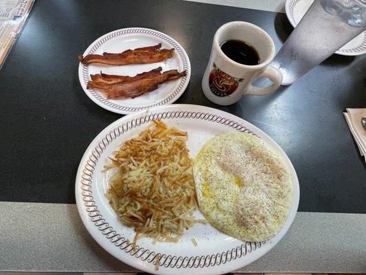 3 eggs over medium & hash browns scattered w/ bacon & hold the toast plate, coffee & ice water.