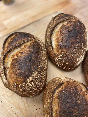 Oat Porridge Honey Sourdough - Naturally-leavened,  includes cooked oats and is sweetened with local honey.