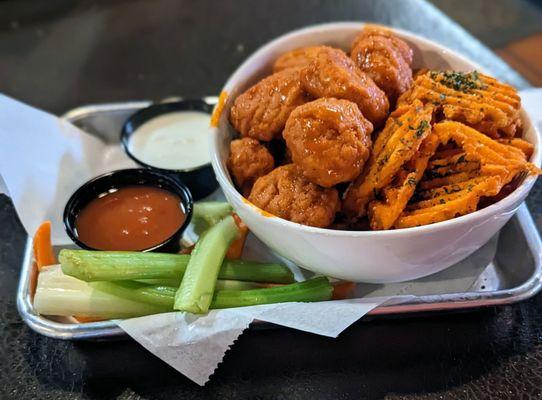 Boneless wings and sweet potato fries.