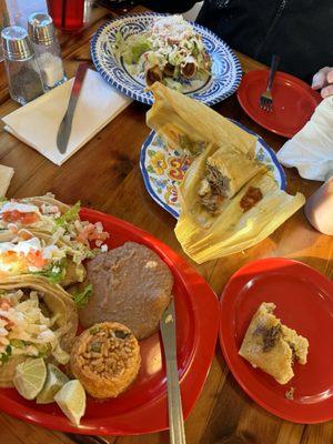 Tamale in middle; 3 fish tacos (left) w/fried beans and rice;, on top of photo ,  3 tacos dorados =potato and marinated chicken