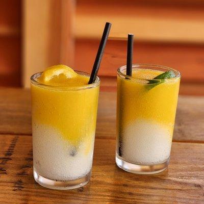 Boozy slush mix of mango sake and Gin & tonic