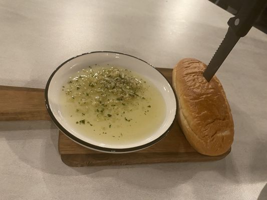 Complimentary bread with seasoned olive oil for dipping