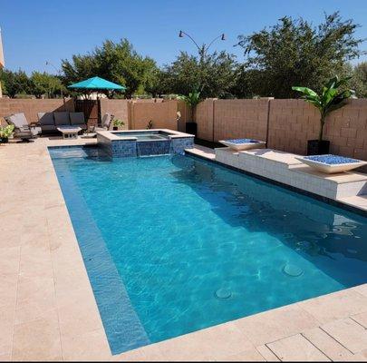 Pool/spa and 3 fire bowls with travertine decking