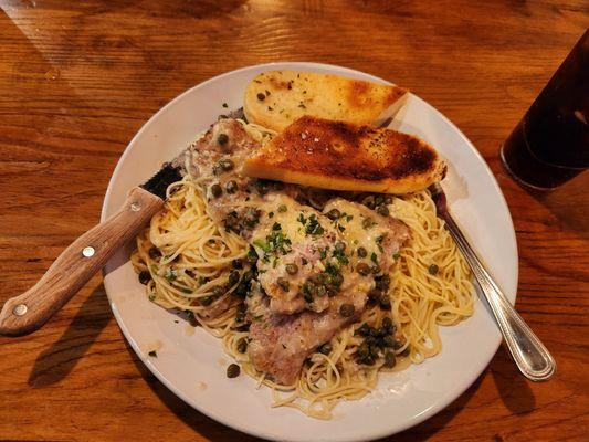 Veal piccata. Forgot to take the photo before I started digging in so it doesn't do justice to their actual beautiful presentation.