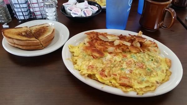 Veggie Omelette, crispy hash browns and grilled Rye toast