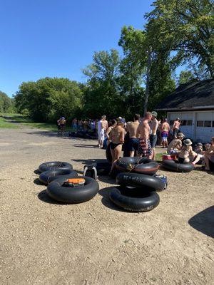 The line for the bus back to the campground. What a joke. Not to mention you're literally waiting at someone's house.