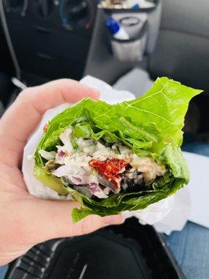 Mixed Greens & Chicken Salad  on a lettuce wrap. VERY good! Added sun dried tomatoes, capers, and red onions