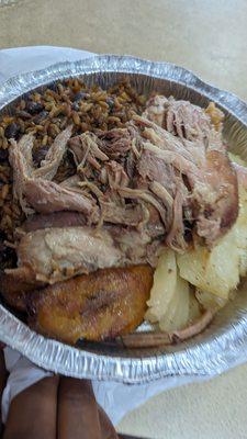 Roast pork, sweet plantains, yuca and morill rice