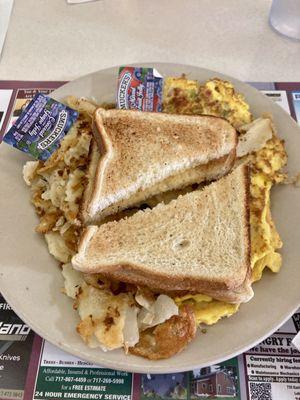 Western omelette with home fries with onions and toast. Delicious!