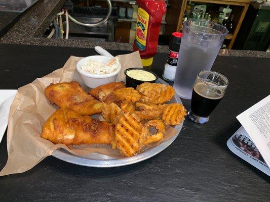 Fish and chips with cod. Sampler size Irish stout.