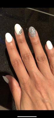 Acrylic nails with gel polish and gem design