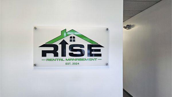 Indoor signage with business logo.