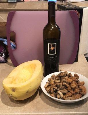 The wine is from COSTCO!  The spaghetti squash, HEB sausage and fresh, cooked mushroom.