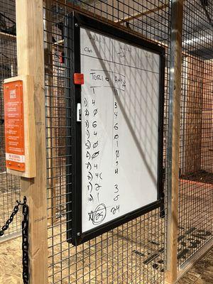 They have white boards inside each throwing cage so you can play games and track your score!!