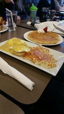 Traditional eggs Benedict with chocolate chip pancake