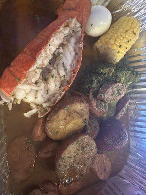 Lobster boil with shack and Cajun sauce