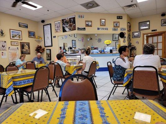 Inside of La Creperie Kafe, and there is outdoor dining as well.