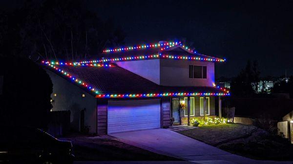 Here's a multi color display in Oceanside that includes lights on the top roof ridge.