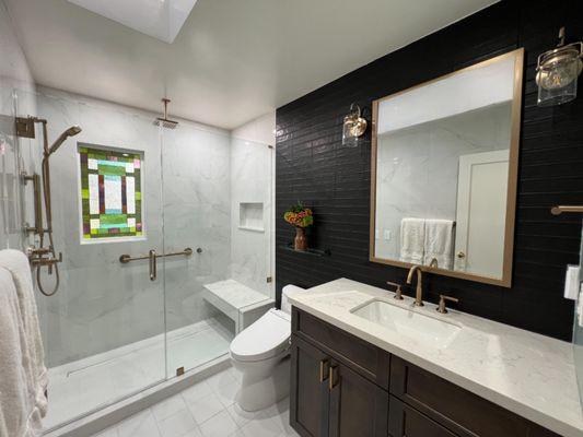 Discover the perfect blend of modern elegance and family functionality in this newly remodeled bath.