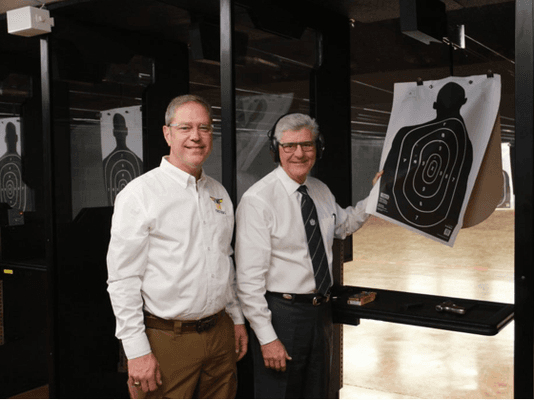 Governor Phil Bryant helps break in the range.