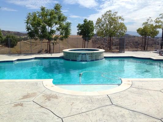 White plaster pool & spa.