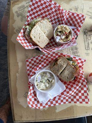 Sandwiches, pasta salad, and potato salad